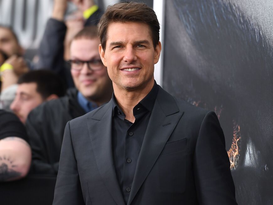 Tom Cruise lächelt in die Kamera