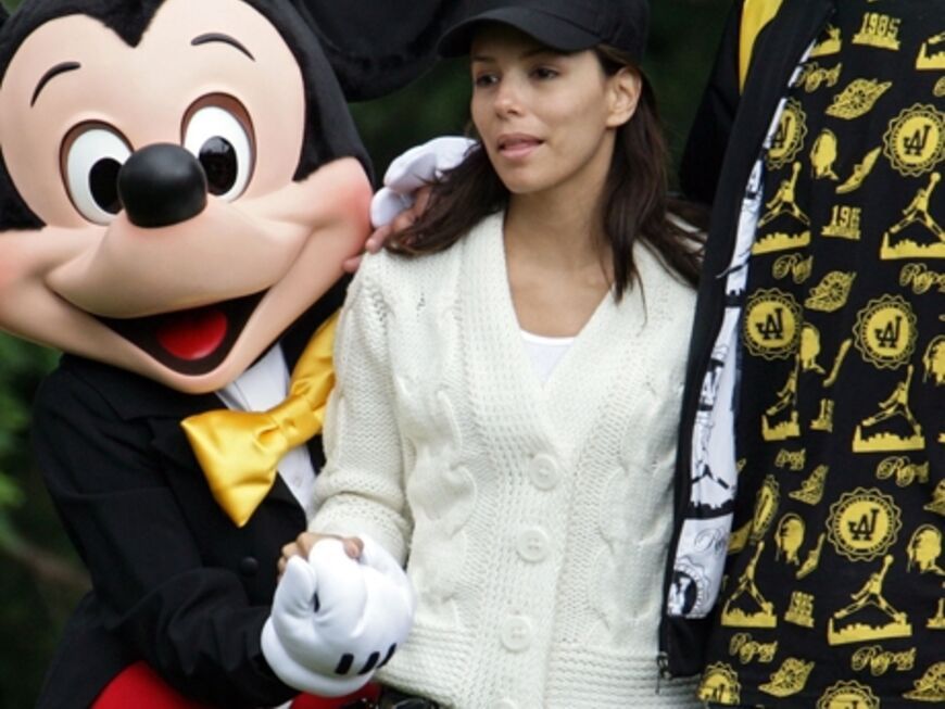 "Mickey Mouse" bietet Eva Longoria Parker und ihrem Mann Toni eine spontane Rundführung durch Disneyland an