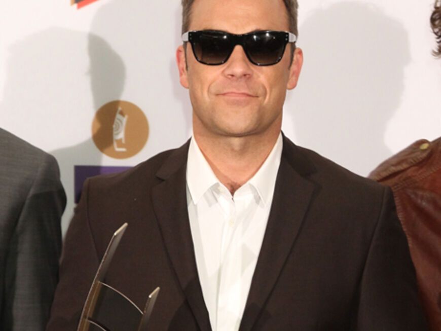 Robbie Williams und seine Jungs von "Take That" holten sich ihren Echo als „Gruppe international Rock/Pop“ persönlich ab