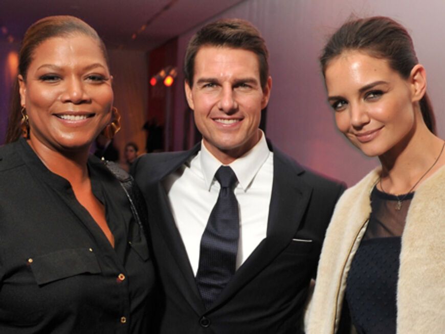 Schausipelerin Queen Latifah stellte sich mit Tom Cruise und Katie Holmes für ein gemeinsames Foto auf