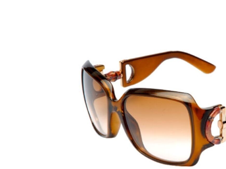 Für St. Moritz: Sonnenbrille in Horn-Optik von 
Gucci, ca. 275 Euro