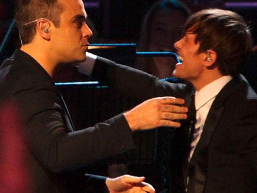 Früher waren sie die besten Freunde, heute stehen sie sich immer noch sehr nahe: Robbie Williams und Mark Owen