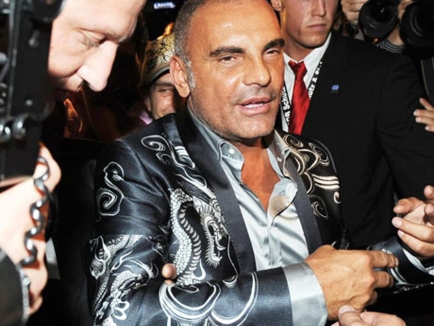 Christian Audigier kämpft sich durch das Getummel