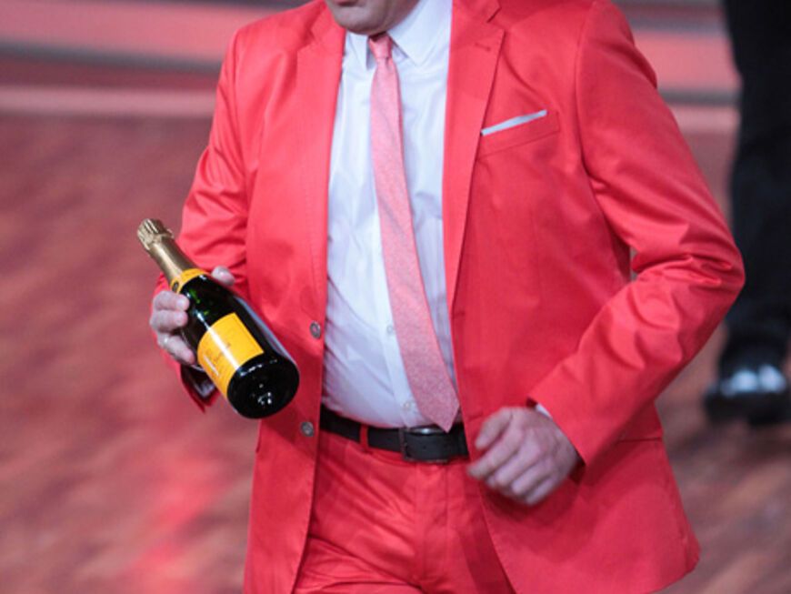 Joachim Llambi mit einer Flasche Champagner