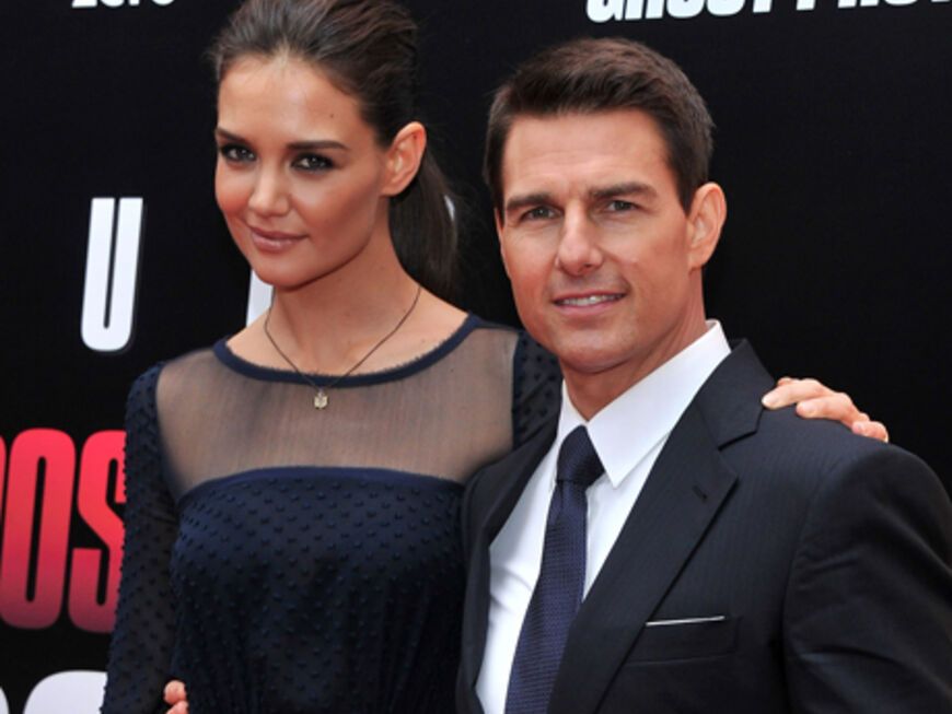 Was für ein Glamour-Auftritt! Katie Holmes bezauberte in einem Kleid aus ihrer eigenen Kollektion "Holmes & Yang", Ehemann Tom Cruise passte seinen Designer-Anzug farblich darauf ab. Perfekt!