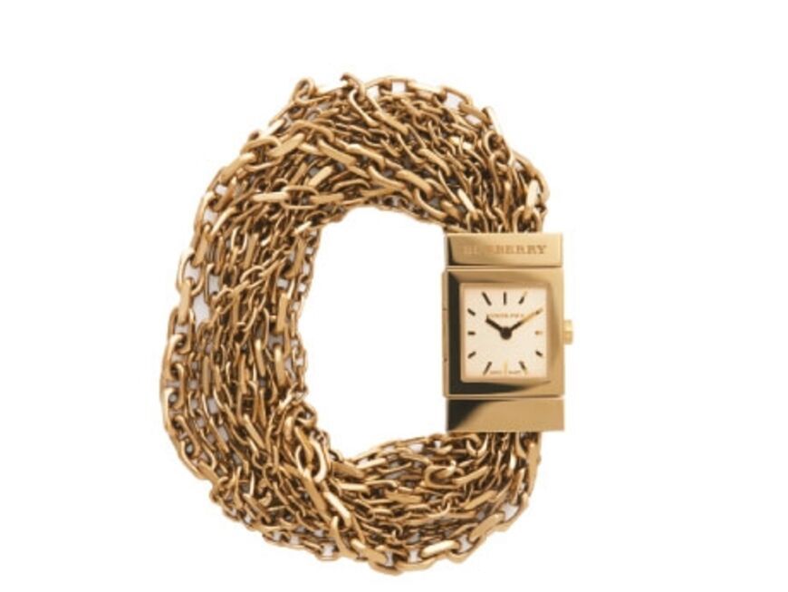 Diese Accessoires machen den Röhren-Look perfekt: Goldene Uhr von Burberry, ca. 595 Euro