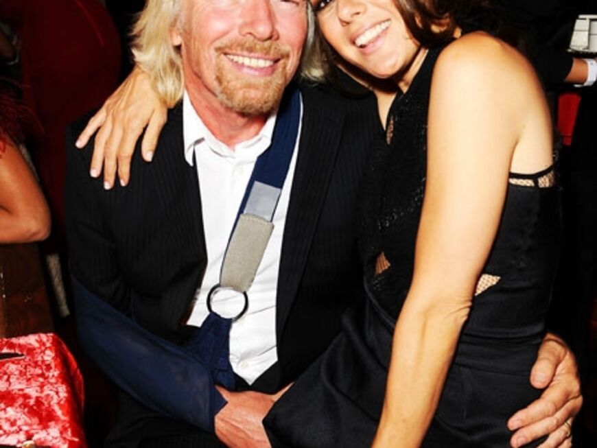 Sir Richard Branson mit Marisa Tomei auf dem Schoß. Die Schauspielerin legte einen Partymarathon hin: So besuchte sie am selben Abend auch die "Hollywood Awards" in Beverly Hills