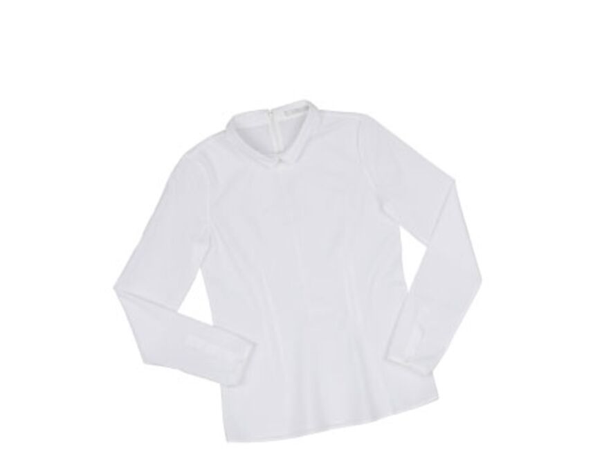 Ein Basic, das nie aus der Mode kommt: weiße Bluse mit Reißverschluss am Rücken von Cos, ca. 50 Euro