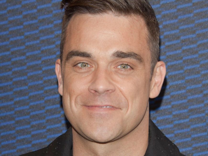 Robbie Williams machte zum Ende seiner Europa-Tour mit "Take That" in München Halt und begeisterte das Publikum der "Cars 2"-Premiere