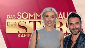Verena Kerth und Marc Terenzi vorm "Sommerhaus der Stars"-Logo